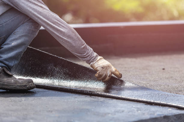 Professional Basement Waterproofing technician working in Lexington, IN